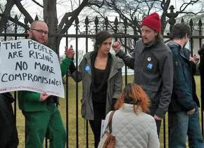 Anti-pipeline protesters lined up at the fence in front of the White House
